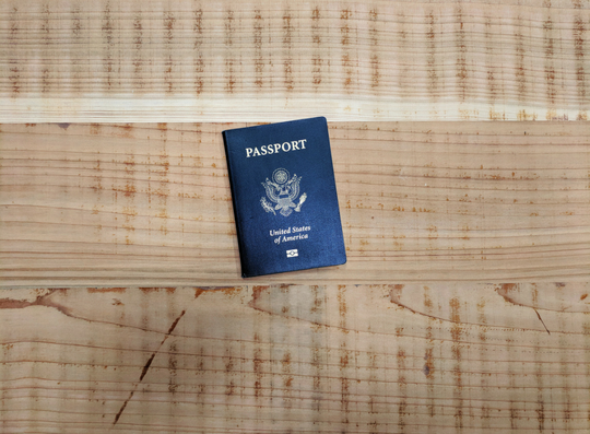 Passport photo by Jeremy Dorrough on Unsplash