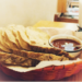 Bread basket with tortillas and salsa