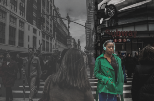 Altered photo highlighting a Black woman on a busy city street